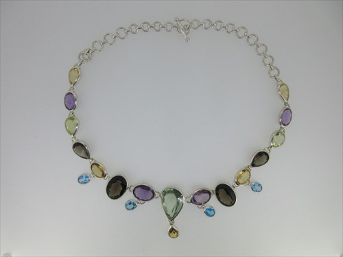 Lot 36 - A multi gem necklace set in silver