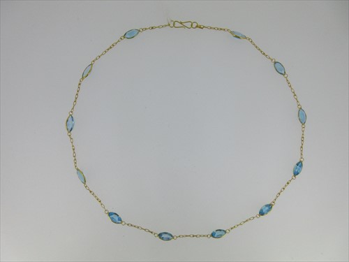 Lot 151 - A blue topaz and chain necklace
