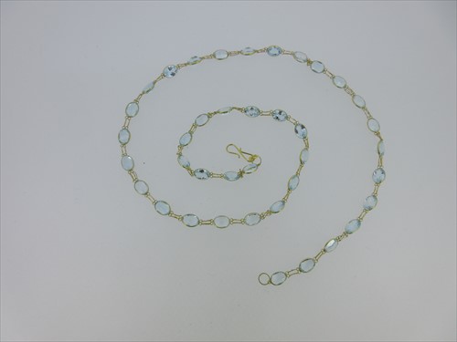 Lot 123 - A pale blue topaz necklace