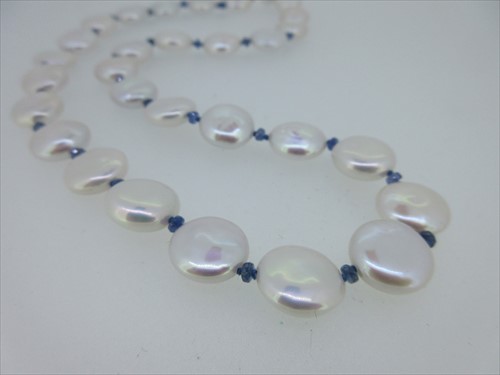 Lot 165 - A sapphire and cultured pearl necklace