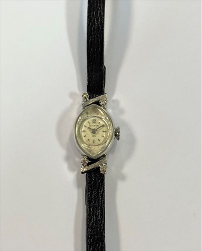 Lot 137 - Bulova - A lady's 14ct gold and diamond set...