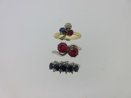 Lot 135 - A red, white and blue trio of ruby, sapphire and diamond rings