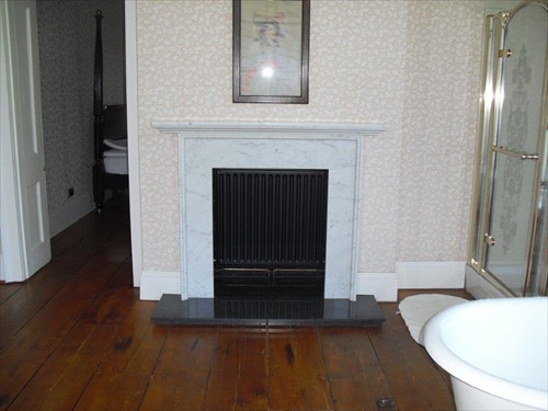 Lot 436 - A variegated Carrera white marble fireplace, late 19th century