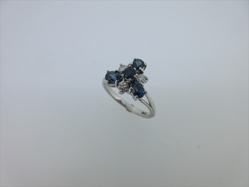 Lot 143 - A modern sapphire and diamond ring