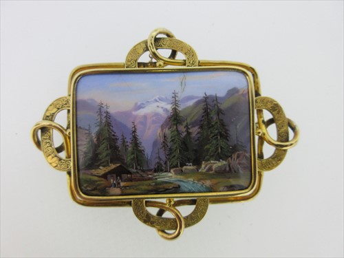 Lot 181 - A mid 19th century enamelled plaque brooch depicting an Alpine scene