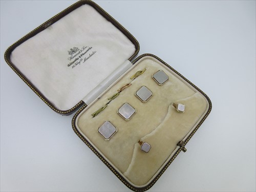 Lot 37 - A cased set of dress shirt and collar studs by Alabaster & Wilson