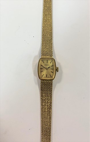 Lot 303 - Tissot - A lady's 9ct gold wristwatch