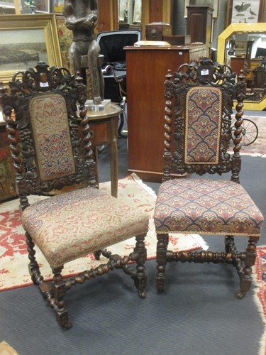 Lot 520 - A pair of 19th century carved oak side chairs