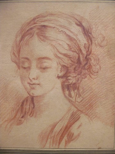 Lot 279 - A red chalk study of a female head, probably...