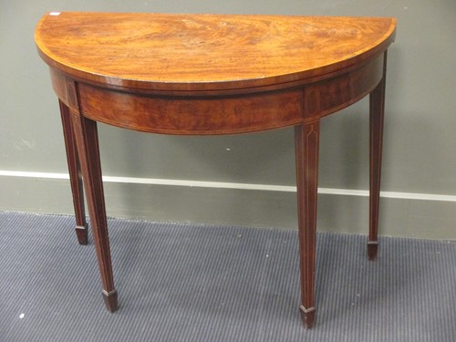 Lot 465 - A 19th century mahogany D fold- over card...