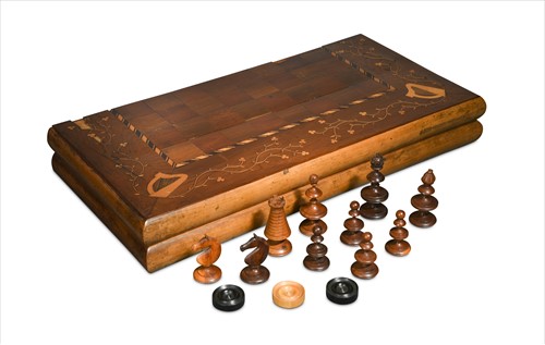 Lot 231 - A mid-19th century Irish Killarney work arbutus and marquetry inlaid yew wood fold-over chess board