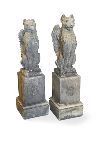 Lot 433 - A pair of reconstituted stone griffins
