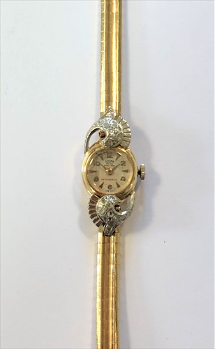 Lot 311 - Dogma - A lady's diamond set cocktail wristwatch