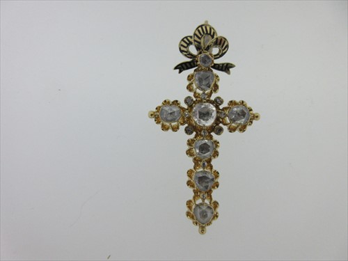 Lot 19 - A Continental diamond set cross with enamel and diamond pendant bale