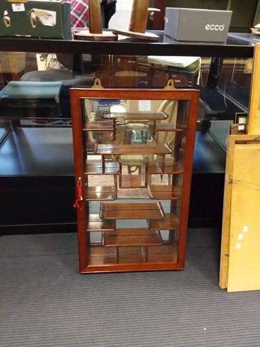 Lot 542 - A modern Oriental glazed hardwood wall mounted...