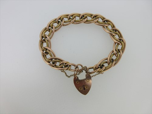 Lot 198 - A fancy link bracelet stamped '9c' with padlock clasp