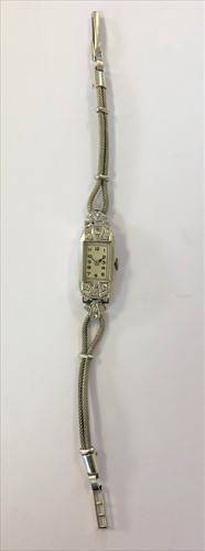 Lot 312 - Unsigned - A lady's diamond set cocktail wristwatch