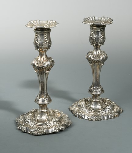 Lot 407 - A pair of George III silver candlesticks