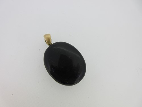 Lot 194 - A Victorian black enamel locket