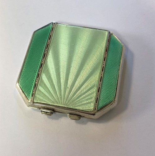 Lot 318 - A George VI silver travelling compact