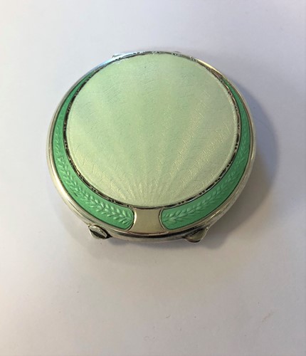 Lot 322 - A George VI silver travelling compact