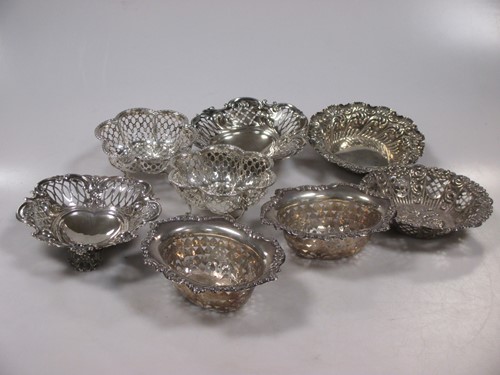Lot 223 - A collection of 8 silver bon bon dishes