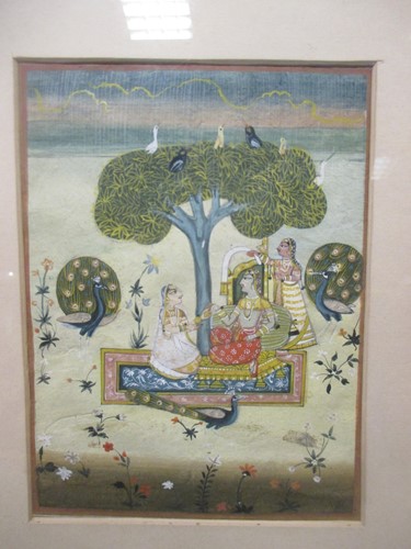 Lot 304 - An Indian school miniature of figures beneath...