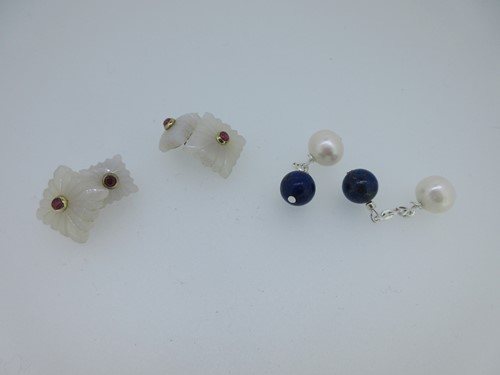 Lot 134 - A pair of chalcedony and ruby cufflinks and a pair of lapis lazuli and cultured pearl cufflinks