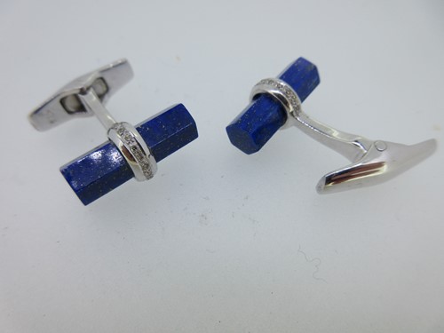 Lot 18 - A pair of lapis lazuli and diamond cufflinks