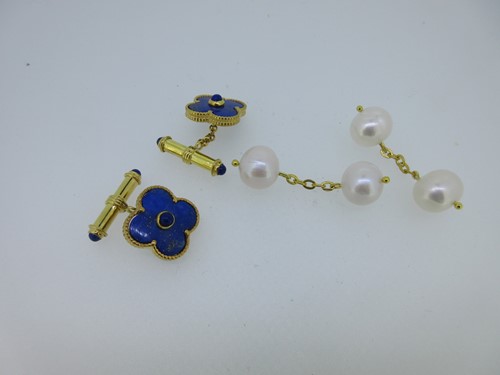 Lot 85 - A pair of lapis lazuli cufflinks together with a pair of double-ended cultured pearl cufflinks
