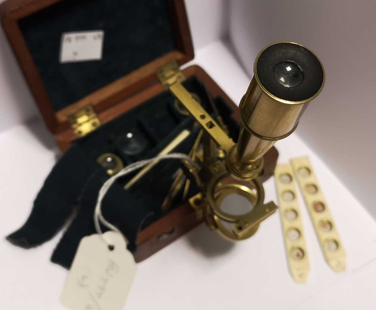 Lot 52 - A miniature brass travelling microscope by Cary, early 19th century