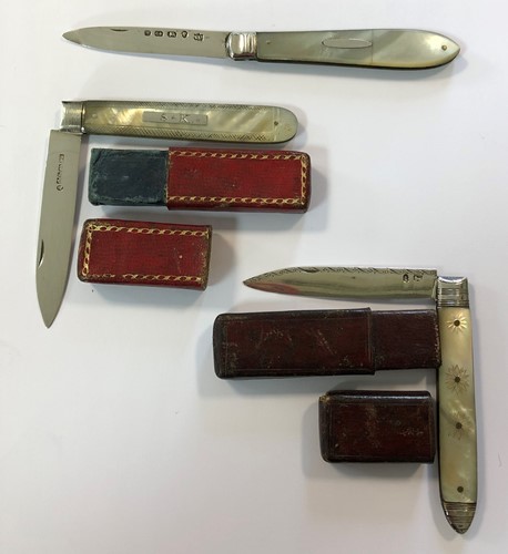 Lot 338 - Three 19th century silver and mother of pearl folding fruit knives, two with their original cases