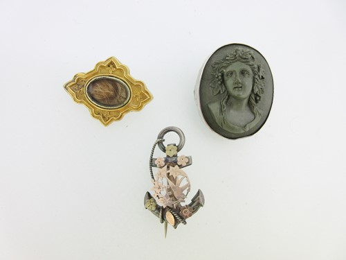 Lot 24 - A William IV memorial brooch and two other antique brooches