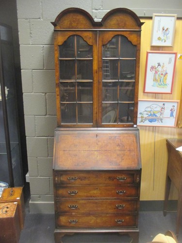 Lot 442 - A Queen Anne style walnut bureau bookcase 210...