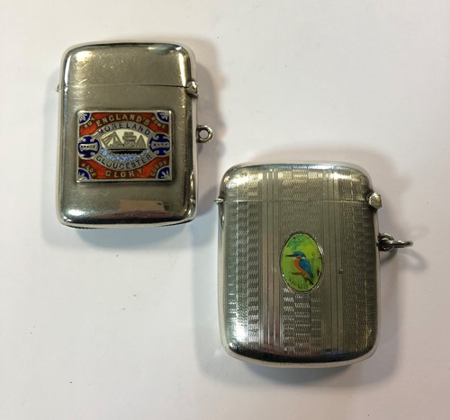 Lot 341 - Two silver vesta cases with enamel decoration