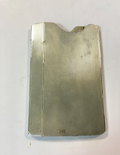 Lot 345 - An unusual George VI silver spring hinged card case