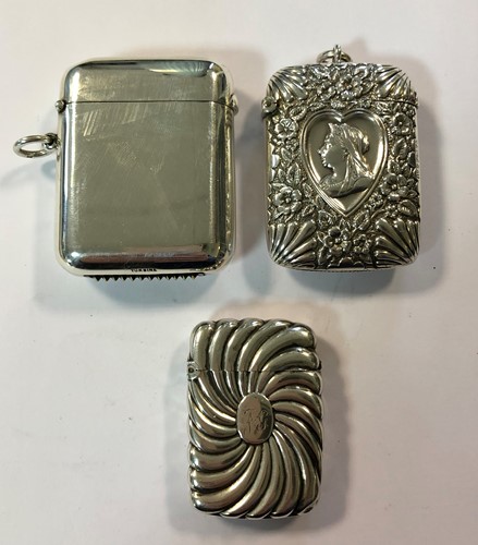 Lot 342 - A trio of silver vesta cases