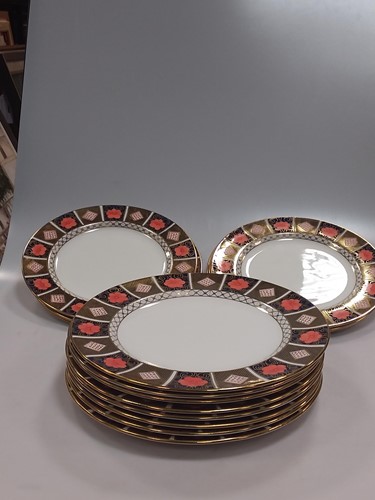Lot 122 - Eight Royal Crown Derby 8458 imari pattern...