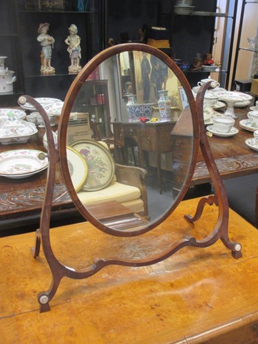 Lot 529 - A 19th century toilet mirror and a fret carved...