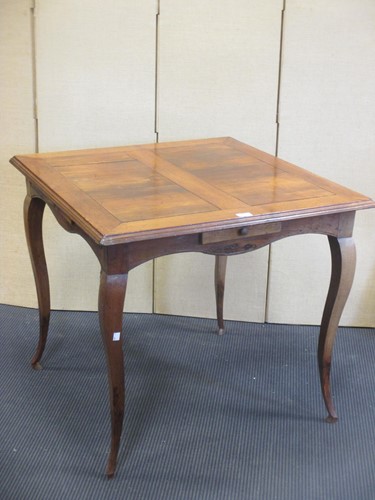 Lot 392 - A 19th century French provincial gaming table...