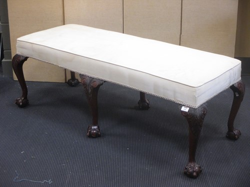 Lot 312 - George II style long stool on ball and claw feet