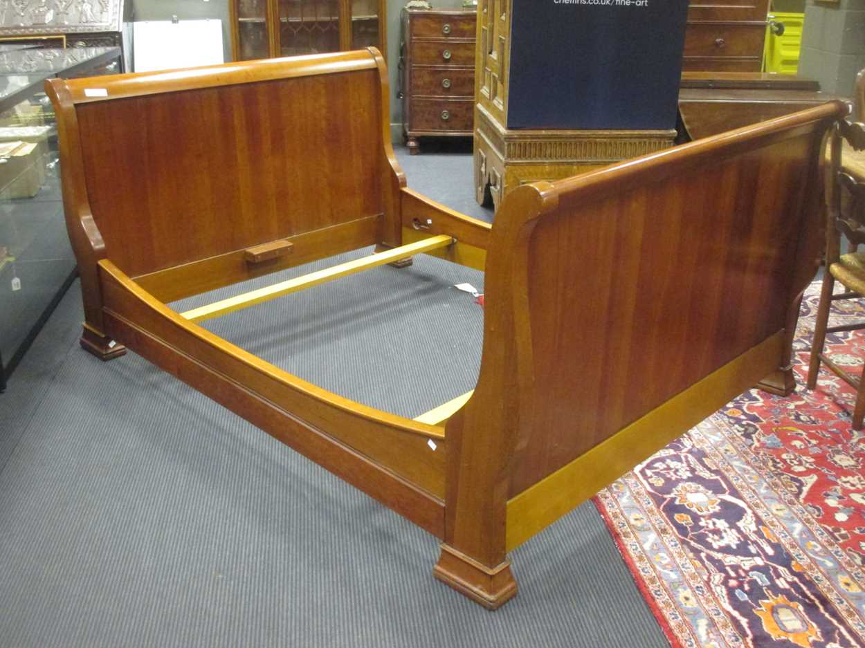 Lot 345 - Simon Horn, cherry wood lit bateau bed,...
