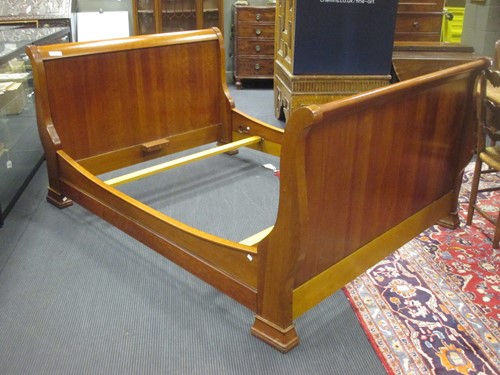 Lot 345 - Simon Horn, cherry wood lit bateau bed,...
