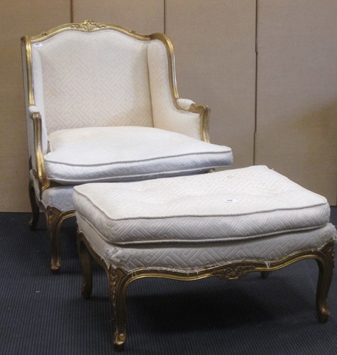 Lot 318 - Louis XV style giltwood armchair and foot...