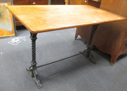 Lot 355 - A worktable with cast iron stand, 77 x 121 x 68cm