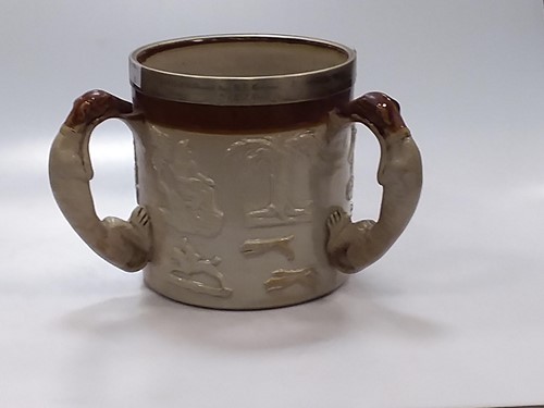 Lot 147 - A three handled loving cup