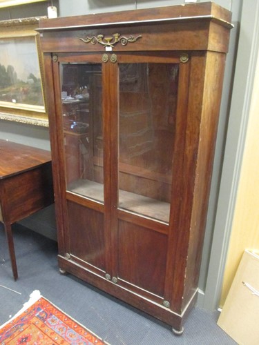 Lot 477 - A French mahogany Empire display cabinet with...