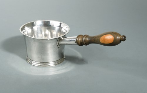 Lot 395 - A Queen Anne Britannia silver brandy pan