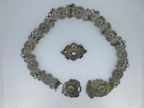 Lot 124 - An Austro-Hungarian gem embellished brooch together with a Russian filigree work belt