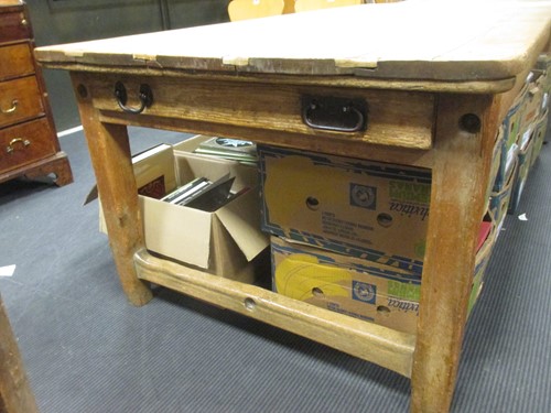 Lot 497 - A Large pine farmhouse kitchen table with...
